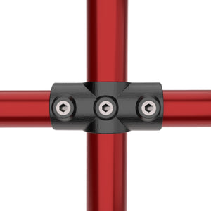 Two socket cross key clamp fitting joining three tubular pipes in a cross configuration.